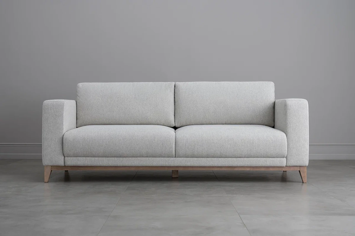 Minimalistiset sohvat mullistavat olohuoneen 2026: Tyylikäs ja monikäyttöinen trendi ilman tyynyjä